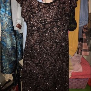 off the shoulder gold and black glitter dress